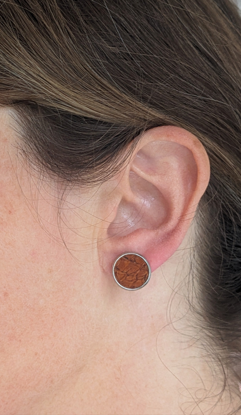 Puce d'oreilles en cuir marin
